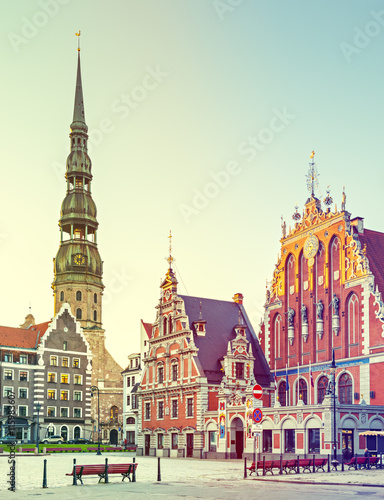 Hall town square with museum of House of Blackheads and Saint Peter church in Riga - capital and largest city of Latvia, major cultural, historical and tourist center of Baltic region