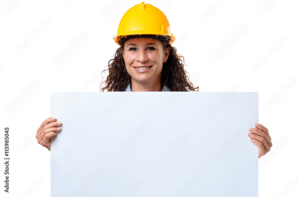 Young female architect holding a blank sign Young female architect holding a blank sign
