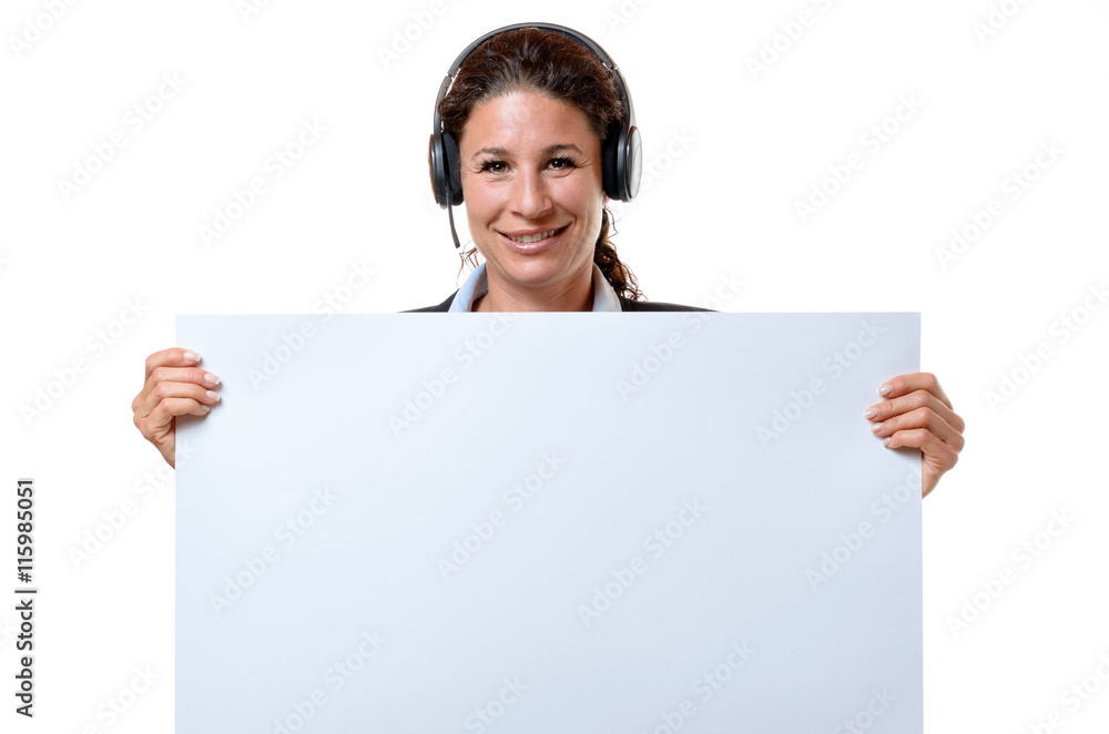 Smiling businesswoman in headphones with a sign Smiling businesswoman in headphones with a sign