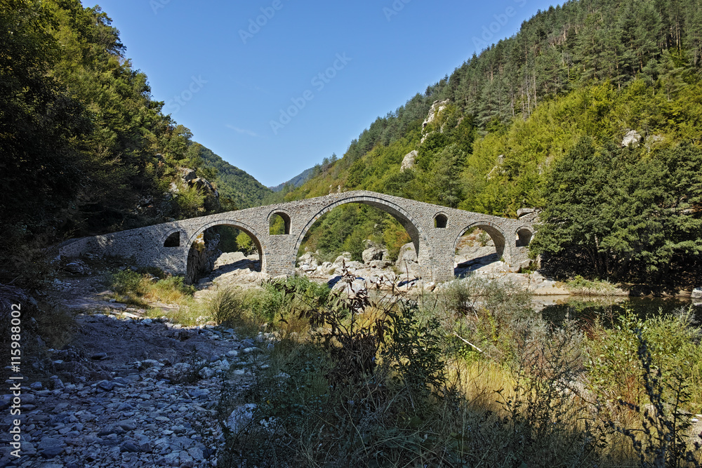 Reflection of The Devil's Bridge in Arda river and Rhodopes mountain, Kardzhali Region, Bulgaria