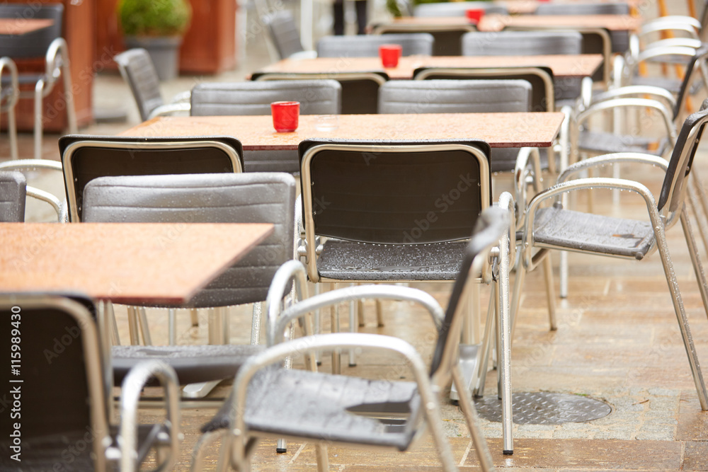 tables of street cafes in Italy