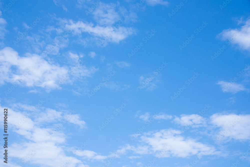 Clear blue sky with white fluffy clouds Clear blue sky with white fluffy clouds