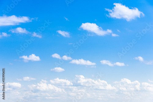 Fototapeta Naklejka Na Ścianę i Meble -  Clear blue sky with white fluffy clouds