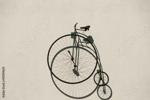 Penny-Farthing Bicycle on Wall