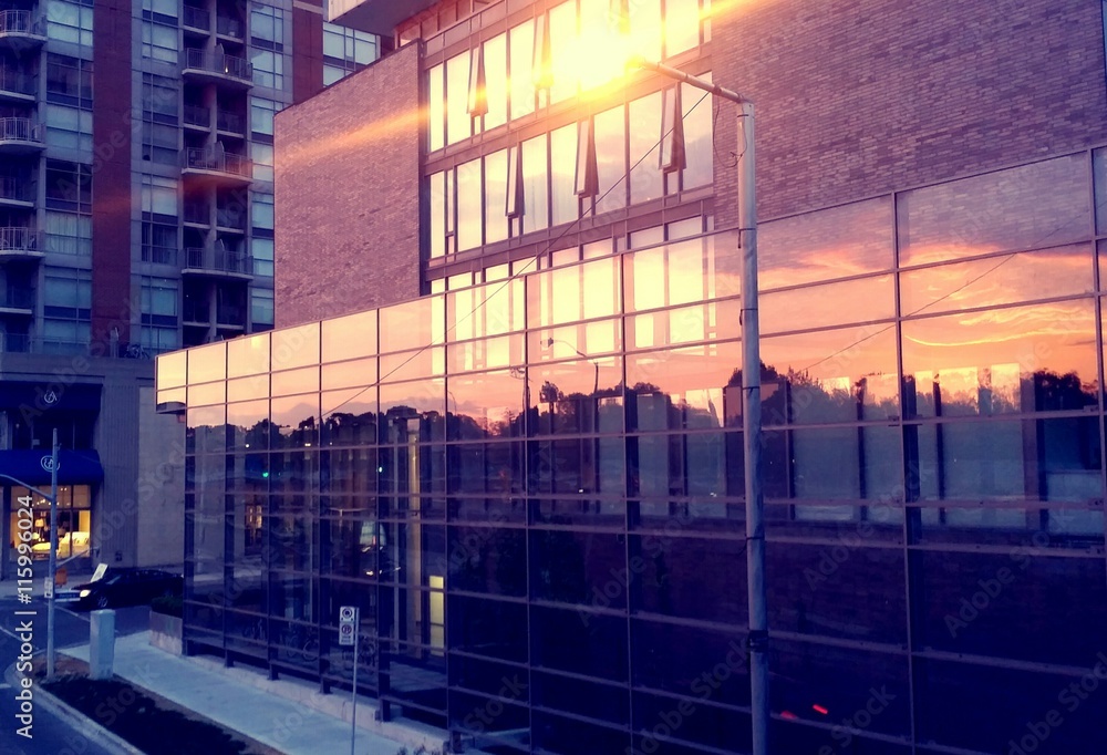 Sunset reflection in modern building windows Sunset reflection in modern building windows