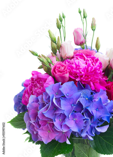 Bright pink peony, eustoma and blue hortensia flowers bouquet close up isolated on white background
