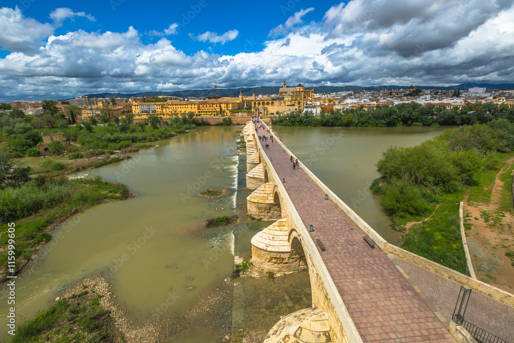 Calahorra Tower overlook on the Roman Bridge, on the Guadalquivir river and Cordoba skyline in Andalusia, Spain.