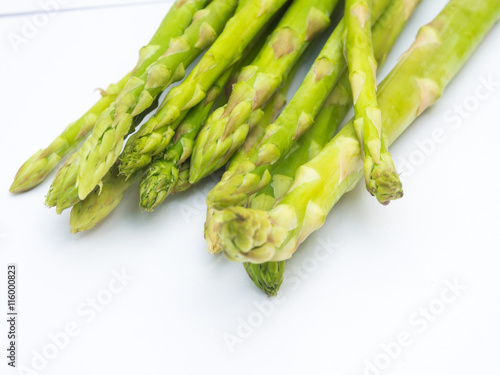 Fresh asparagus low calorie food on white photo