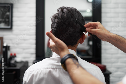 Combing process in barbershop face closeup