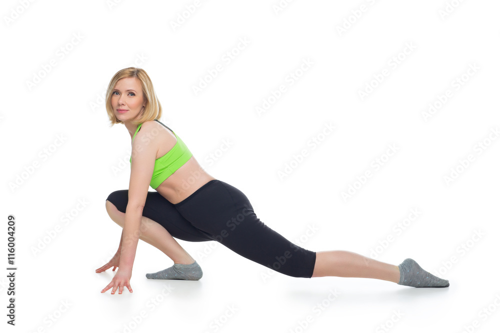Beautiful middle aged woman doing sport exercise Beautiful middle aged woman doing sport exercise