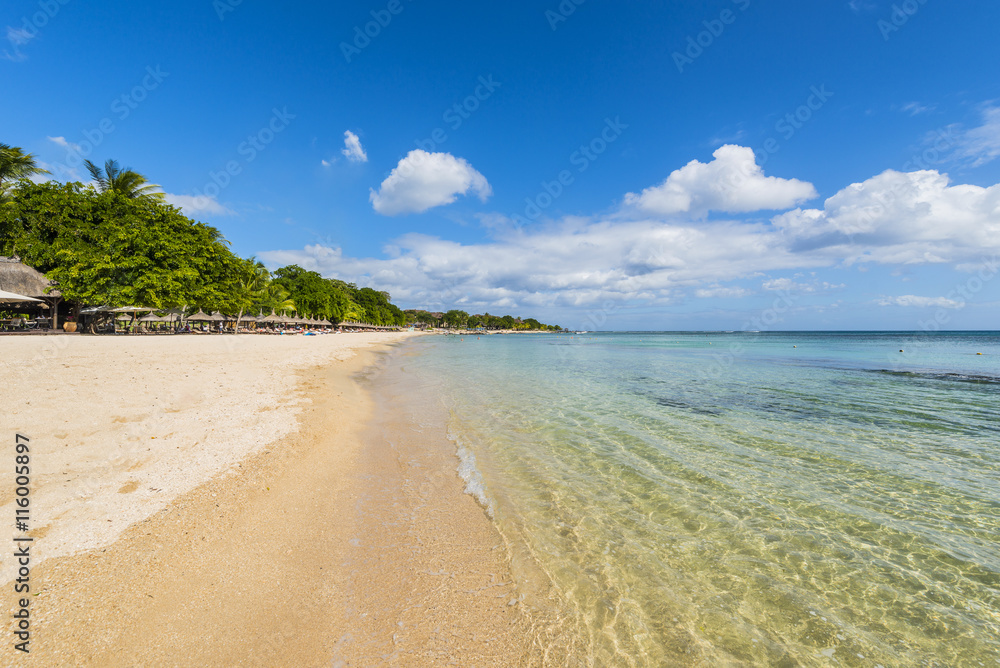 Mauritius beach umbrellas, thatch. Tropical Mauritius island water & beach resort, Turtle Bay - Balaclava