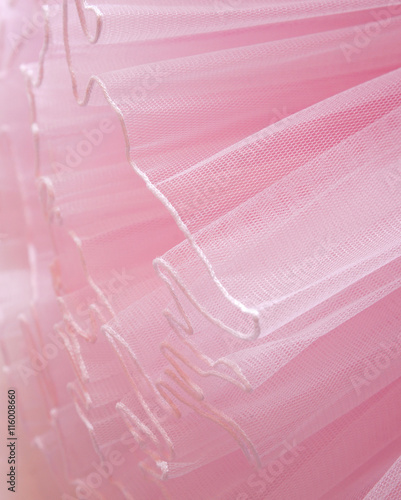Beautiful layers of delicate pink fabric background.