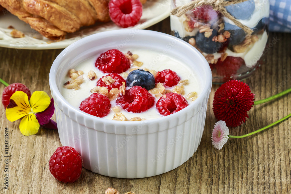 Glass jar with fruits and whipped cream. Glass jar with fruits and whipped cream.