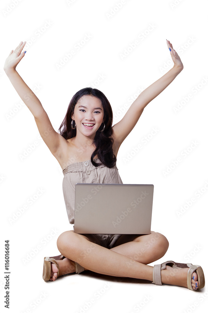 Cheerful girl using laptop Cheerful girl using laptop