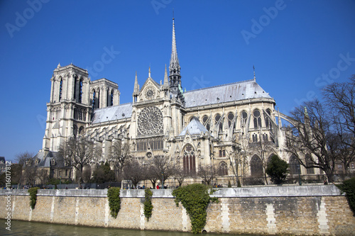 Notre Dame cathedral next to Seine river in Paris, France