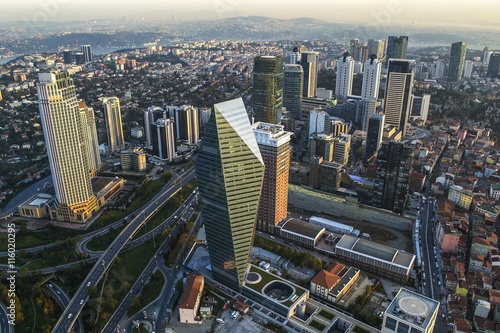 ISTANBUL, TURKEY - AUGUST 23: Skyscrapers and modern office buildings at Levent District. With Bosphorus background. August 23, 2014 in Istanbul, Turkey. © Mariana Ianovska