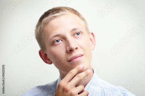 Portrait of thinking young man