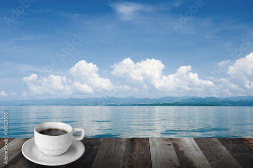 Coffee, mountain, lake and blue sky