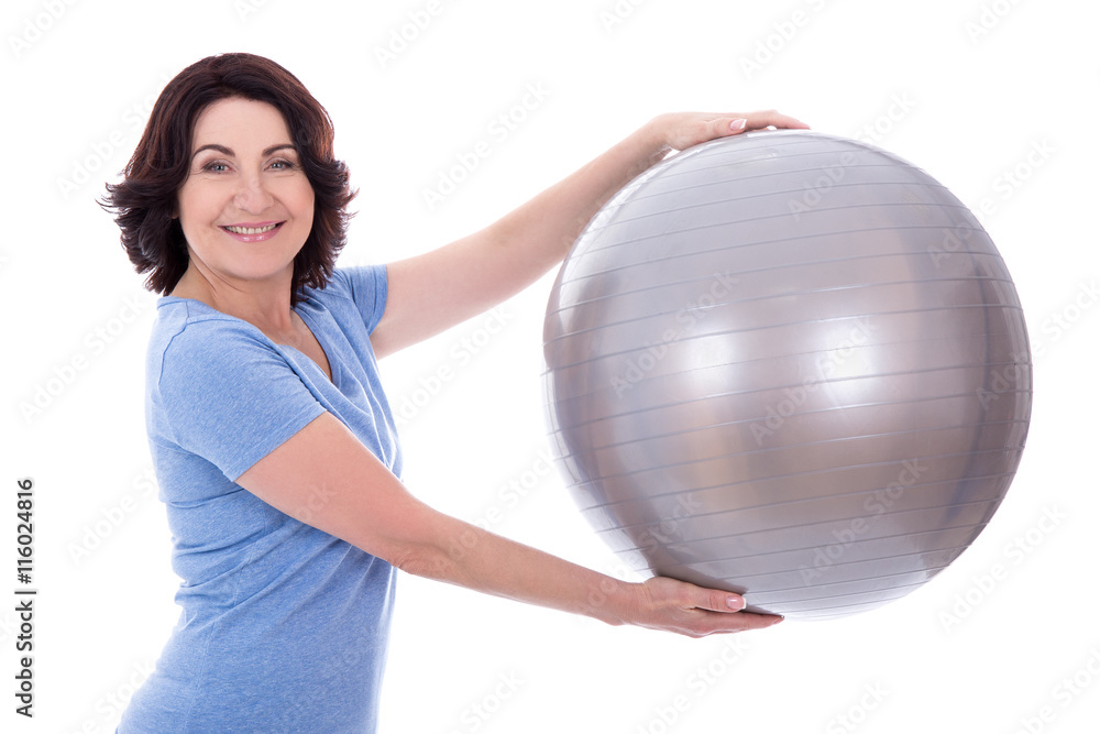 portrait of sporty mature woman with fitness ball isolated on wh portrait of sporty mature woman with fitness ball isolated on wh