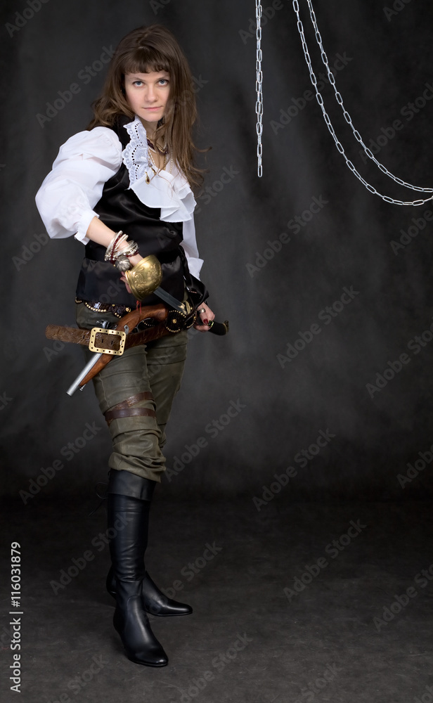 Naklejka premium The girl - pirate with a sabre in hands