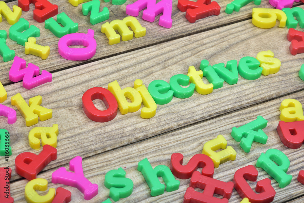 Fototapeta premium Objectives on wooden table