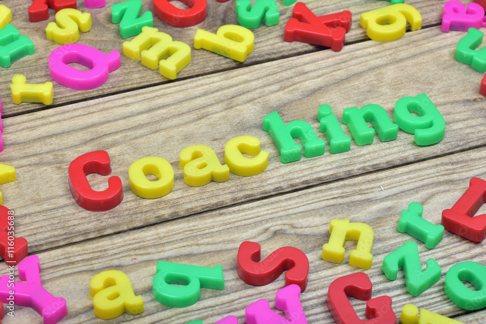 Fototapeta premium Coaching on wooden table