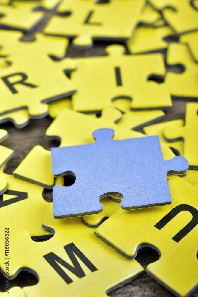 Fototapeta premium Puzzle on wooden table