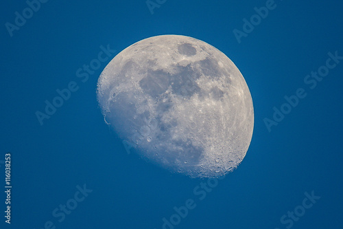 Moon on blue sky before the night background 