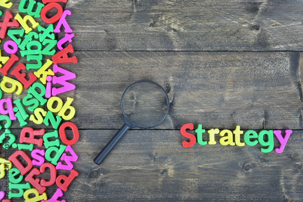 Strategy on wooden table Strategy on wooden table