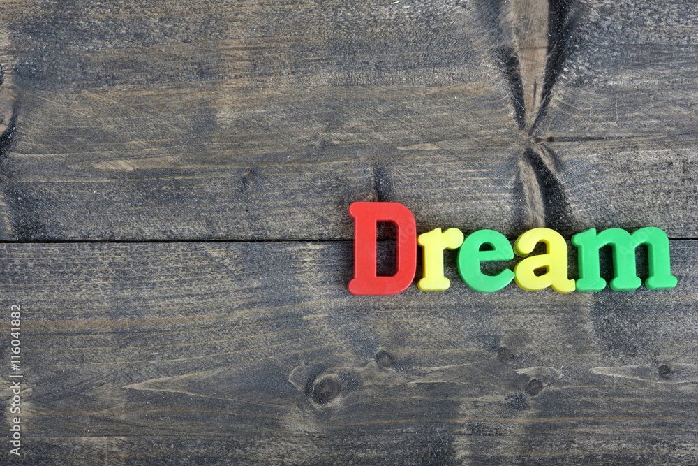 Fototapeta premium Dream on wooden table