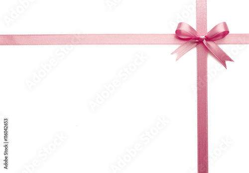 Fotografie Pink ribbon bow on white background