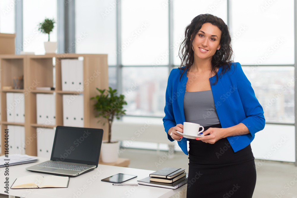 Successful business woman looking confident and smiling. Successful business woman looking confident and smiling.