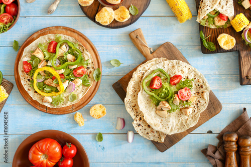 Tortilla with grilled chicken fillet and grilled vegetables