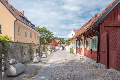Medieval alley in the historic Hanse town Visby on Swedish Baltic sea island Gotland