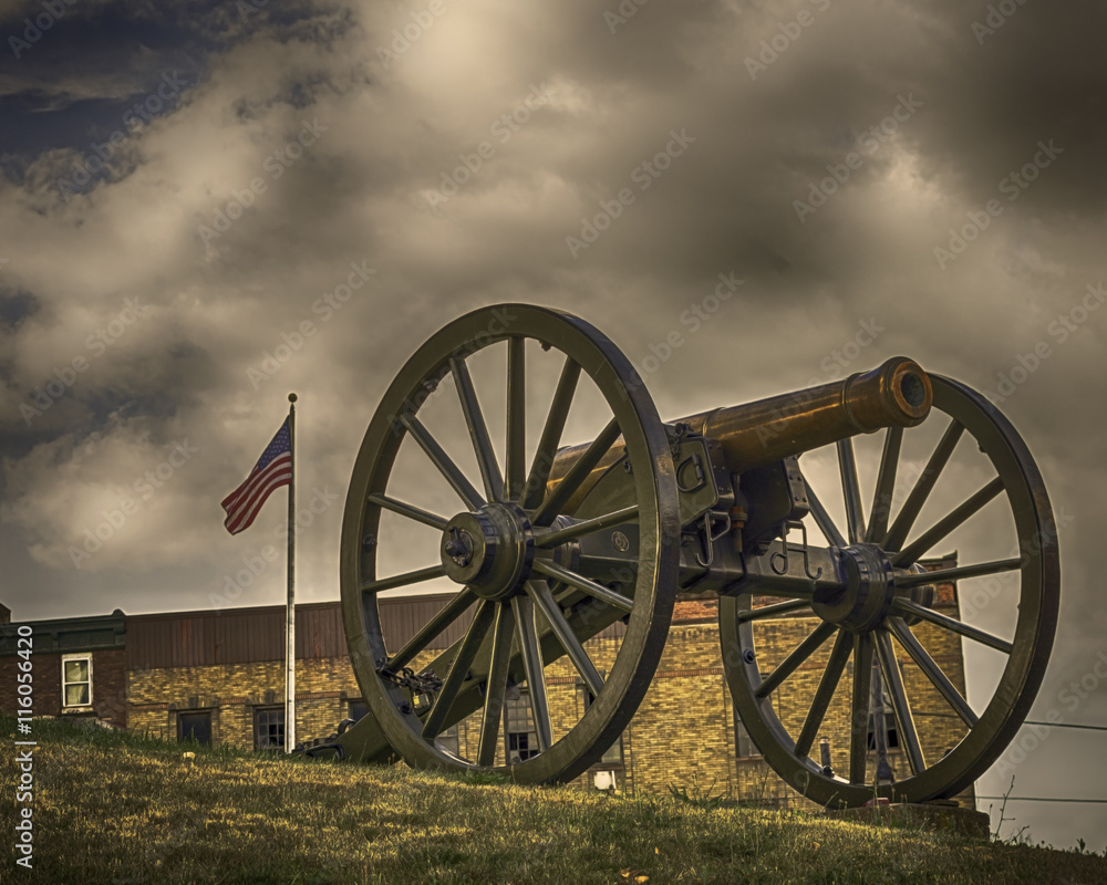 Cannon with American flag in background