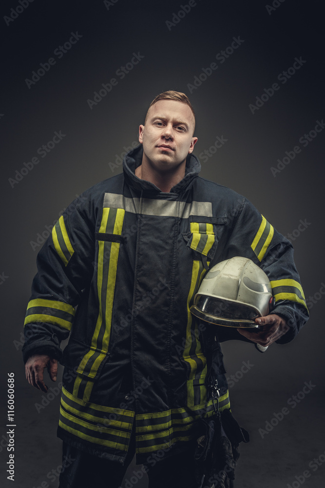 Portrait of male in firefighter costume. Portrait of male in firefighter costume.