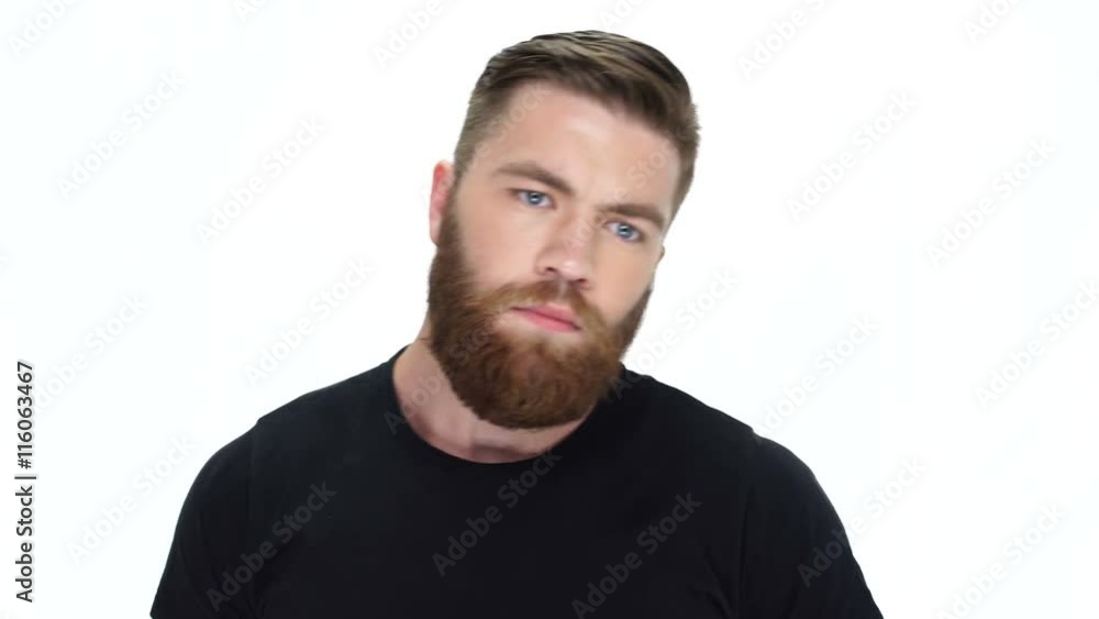 Young pensive bearded man looking for something Young pensive bearded man looking for something