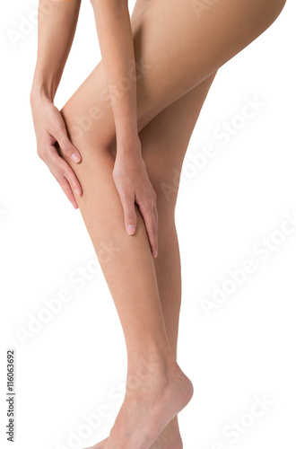 Asian woman holding her calf and shin with massaging in pain area, Isolated on white background.