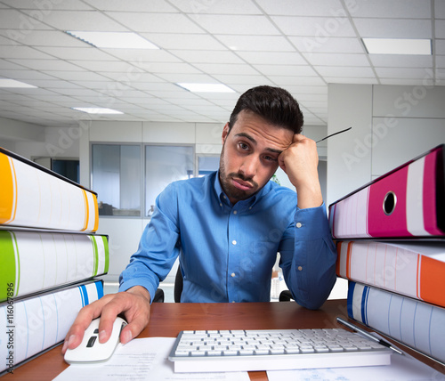 Man doing a boring job photo