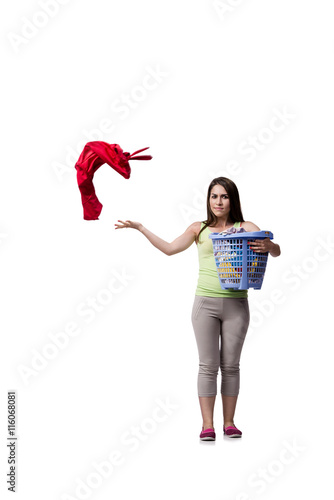 Woman feeling sressed after doing dirty laundry photo