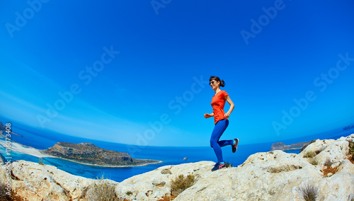 woman running on the rock © vitaliymateha