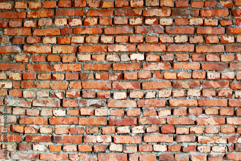 Fototapeta premium Ancient red brick wall - background