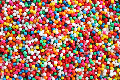colorful sugar sprinkles background.
