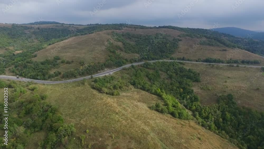 green hills of the area from a bird's flight green hills of the area from a bird's flight