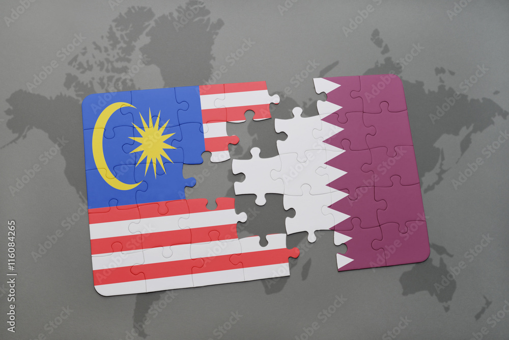 puzzle with the national flag of malaysia and qatar on a world map ...