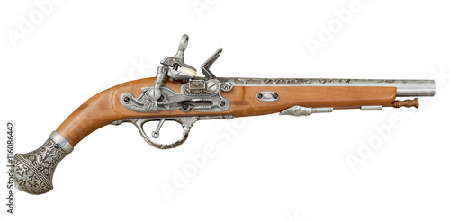 Ancient piracy pistol on white background photo