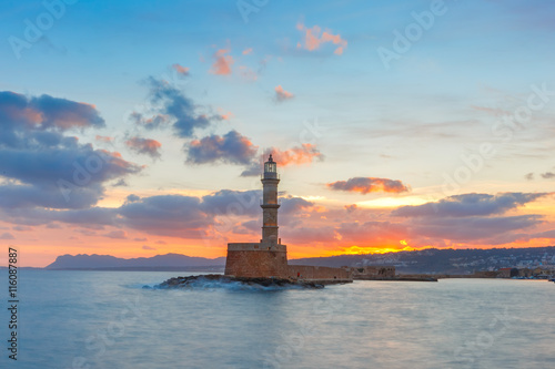 Lighthouse in old harbour of Chania at dawn, Crete, Greece