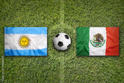 Brazil vs. Mexico flags on soccer field