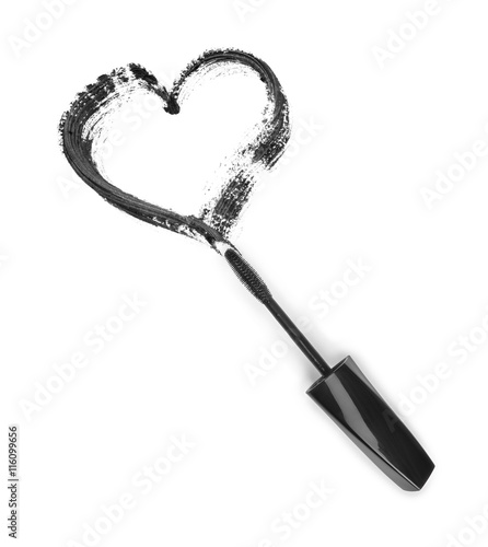 Stroke of black mascara in the form of heart with applicator bru
