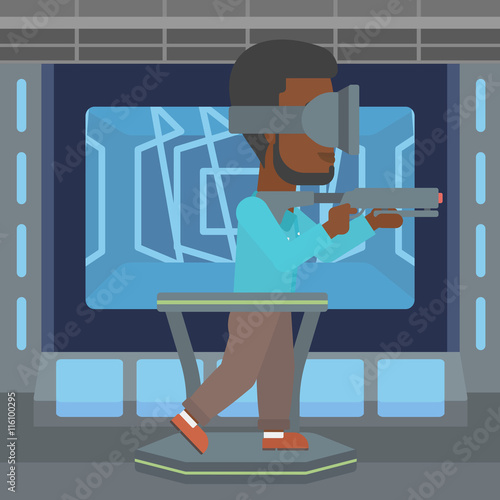 Man in virtual reality headset playing video game.